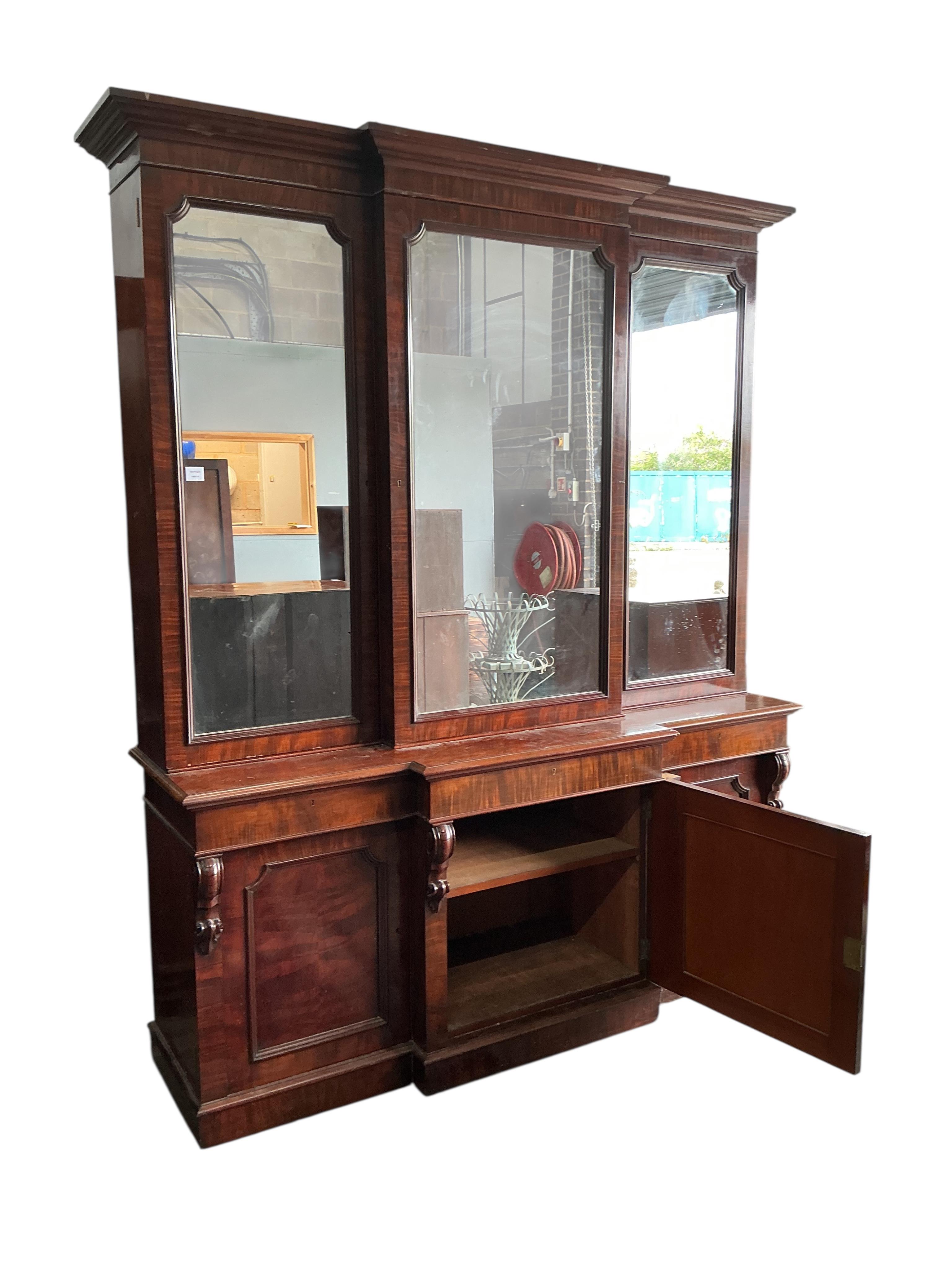 A Victorian mahogany breakfront library bookcase, width 200cm, depth 54cm, height 238cm